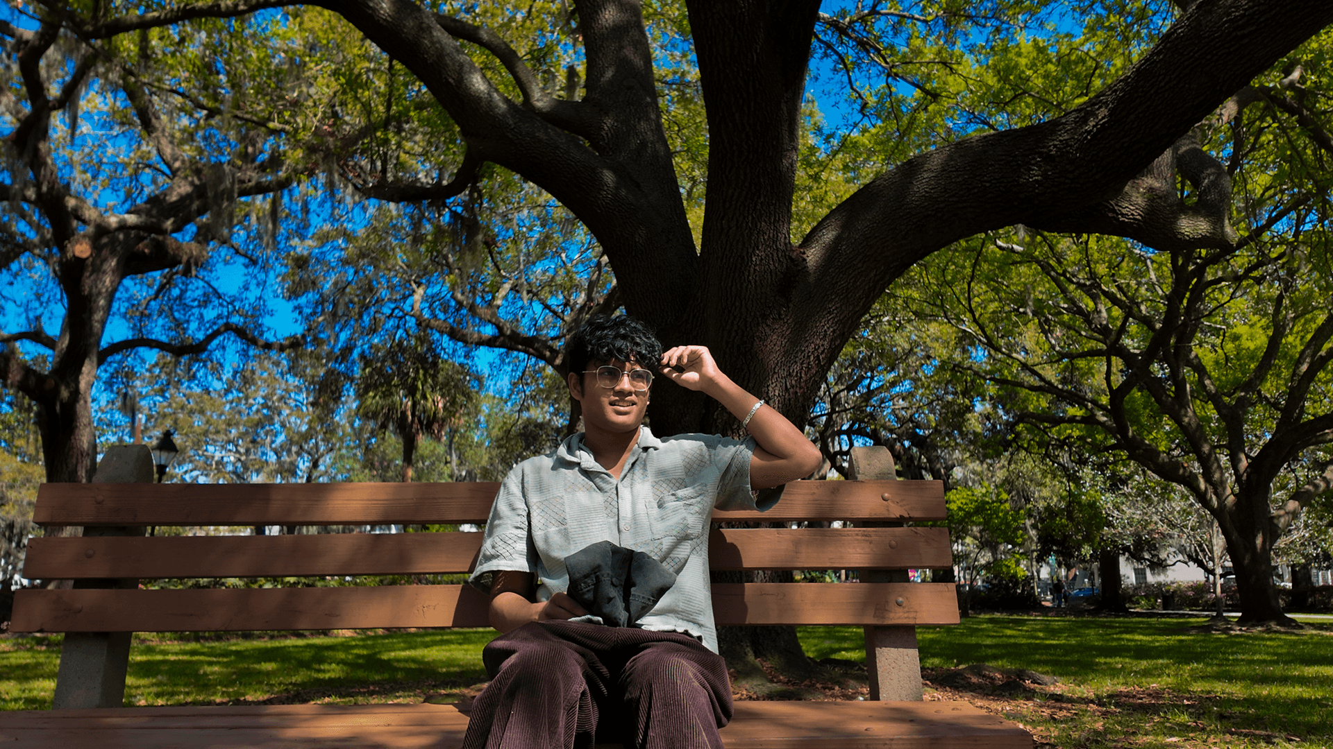 Ayush Basu sitting on a bench, Atlanta